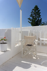 Empty Chair on Greek Balcony