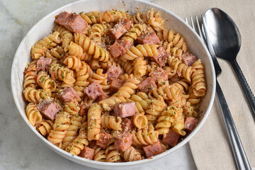 fusilli  pasta with  diced spam  and seasoning