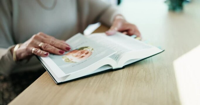 Hands, bible and senior woman praying at table for religious guidance, healing and loss of husband. Home, Christian and elderly person with funeral pamphlet for spiritual support, faith and mourning