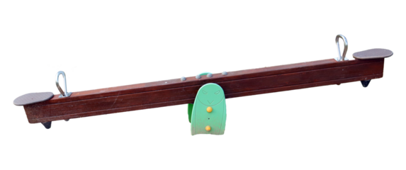 A wooden seesaw with grey seats on each end and a green base on one side. The seesaw is isolated against a transparent background.