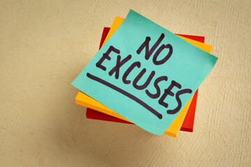 No excuses reminder. A motivational handwriting on a  sticky note.