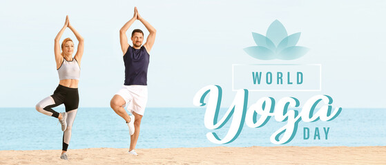 Sporty couple practicing yoga at sea resort