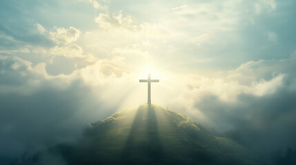Krzyż symbolizujący śmierć i zmartwychwstanie Jezusa Chrystusa na wzgórzu Golgota. Niebo jest spowite światłem i chmurami, tworząc wzniosłą i mistyczną atmosferę tego świętego miejsca. © Sawyer0