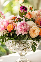 Beautiful bouquet of colorful various flowers in a glass vase