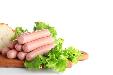 Board with tasty thin sausages and lettuce on white background