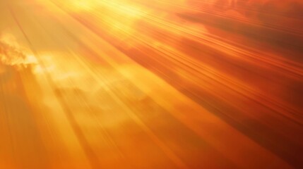 Fototapeta premium Warm golden light beams with lens flare creating abstract sunrise background.