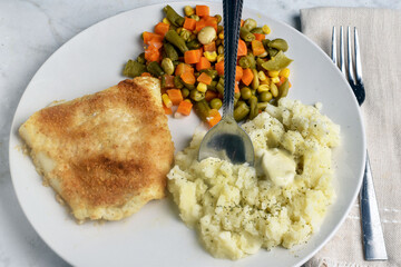 baked cod  with  mash potatoes with mixed vegetables