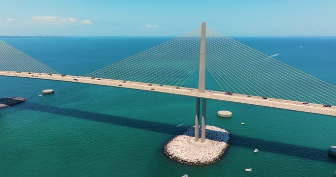 Transportation infrastructure of Florida, USA. Sunshine Skyway Bridge over Tampa Bay with driving traffic cars