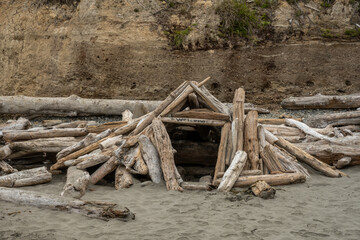 Small Drift Wood Structure On Beach In Olympic