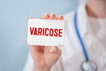 Doctor keeps a card with the name of the diagnosis - varicosity.