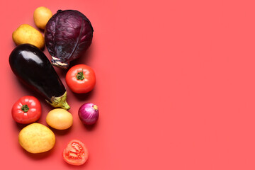 Different fresh vegetables on red background