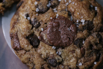Close up shot of homemade chocolate chip soft cookies with sea salt 