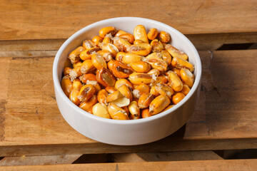 Crisp and golden roasted corn kernels served in a bowl.