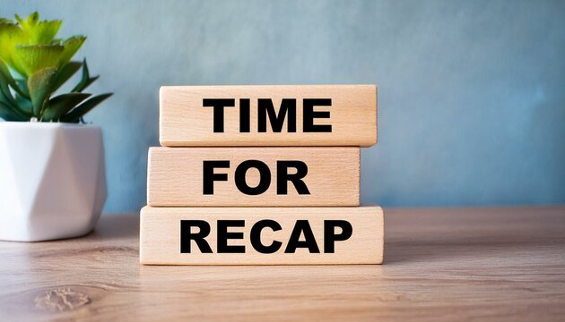 Wooden blocks with words 'TIME FOR RECAP'.
