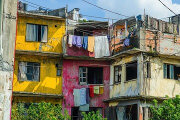 Colorful shanties stand alongside opulent villas, highlighting the stark social inequality amidst contrasting living conditions. Generative AI