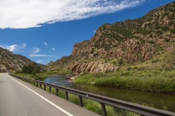 Road beside the Arkansas River flowing through Royal Gorge Canyon, Colorado