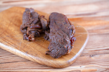 Braised beef on a cutting board