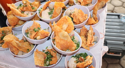 Bakso Malang, meatball soup from Malang, East Java served with noodles, tofu, and fried pangsit or dumplings