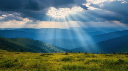 Sunbeams Piercing Through Clouds Over a Mountain Range