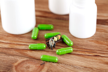 Miniature scene, people suffering from illness and tortured by drugs