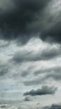 Time lapse of flying grey clouds, no flicker, no birds.