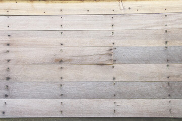 Obraz premium Old wood light brown weathered texture with nail patterns and cracked on background