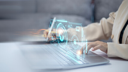 A woman is using a laptop with AI can detect suspicious behavior or cyberattacks attempting to...