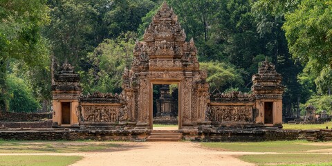 Fototapeta premium Ancient Stone Gateway in Lush Jungle Angkor Wat Cambodia