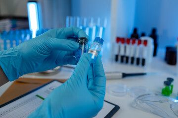 working atmosphere in the laboratory, chemistry and science specialist working in a lab with...