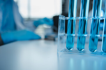 working atmosphere in the laboratory, chemistry and science specialist working in a lab with various experimental equipment and substances, experimental professional working in the lab