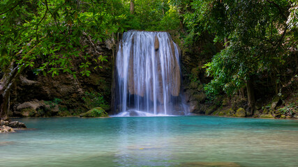 Fototapeta premium Deep forest waterfall in Thailand. Erawan waterfall National Park Kanjanaburi Thailand.