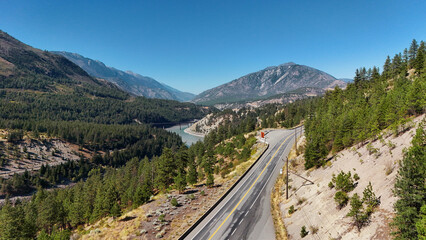 Aerial view of Highway 1 next to Fraser Canyon close to Lytton during a summer season in British Columbia, Canada