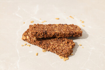 Delicious granola bars on a white background