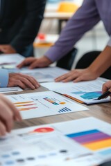 A leadership team reviewing feedback on cultural initiatives. Desk with feedback forms and diversity reports