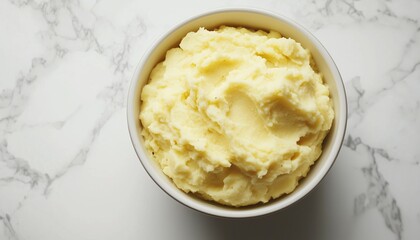 Mashed boiled potatoes or steam peel on ceramic bowl in white table for real food healthy lifestyle
