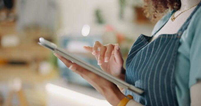 Hand, woman and scroll on tablet in cafe for online order management, inventory control and schedule delivery. Waitress, business owner and digital of e commerce stock, menu planning and food service