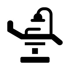 dental chair glyph icon