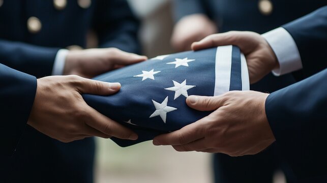 Honoring the Fallen:  A solemn moment of respect as military personnel carefully fold the American flag, a symbolic gesture of gratitude and remembrance.  