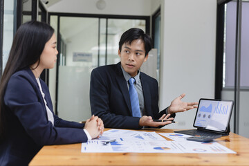 Team of businesswoman working together with analysis report chart in office.