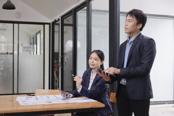 Team of businesswoman working together with analysis report chart in office.