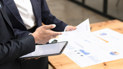 Team of businesswoman working together with analysis report chart in office.