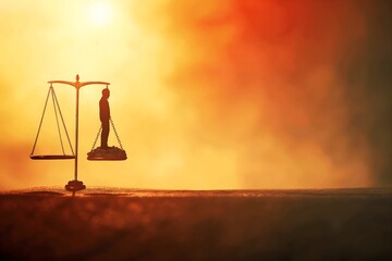 Silhouetted figure standing on a balance scale against a fiery sunset, symbolizing justice, morality, and the weight of decisions.