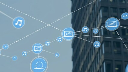 Music and media icons connected by lines, network animation over cityscape - Powered by Adobe