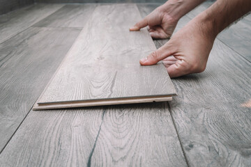 color selection for floor and laying laminate flooring. repair of parquet floor.