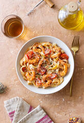 Pasta with shrimps, tomatoes and cheese. Healthy eating. Italian food.
