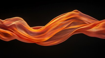 Flowing orange silk fabric gracefully cascading against a dark background.