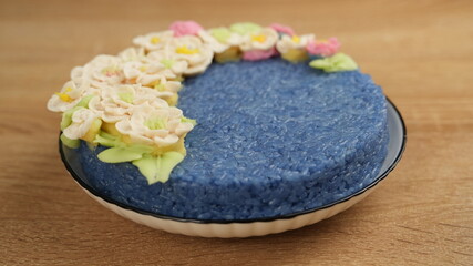 Decorated Butterfly Pea Flower Sticky Rice Dish
