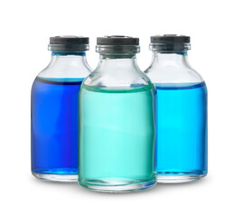 Clear Glass Bottle Containing Bright Blue Liquid on a White Background