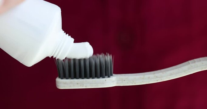 Closeup of tube of toothbrush and toothpaste