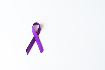 Purple awareness ribbon on white background